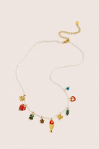 Collier de perles avec pendentifs